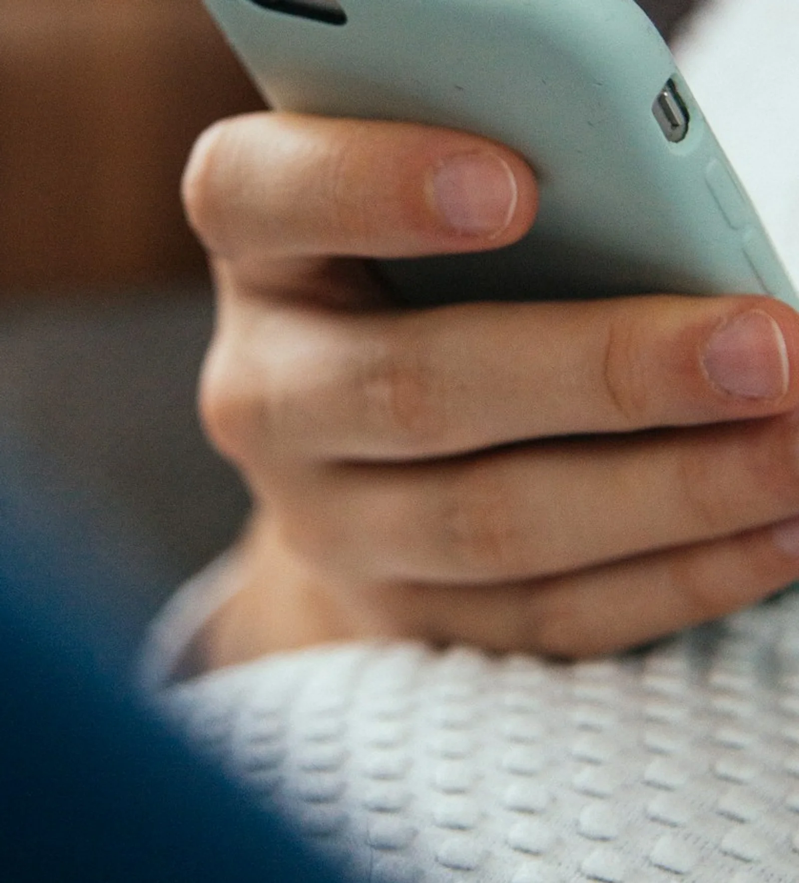 A buyer comparing product options on a phone