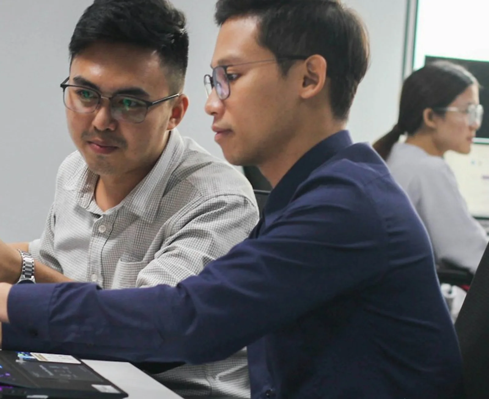 Supplier shortlist review with notes and next-step planning on a laptop