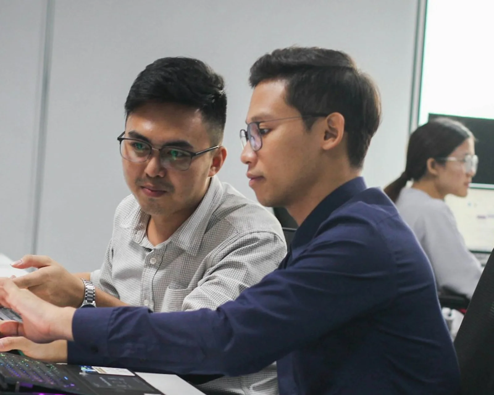 A buyer reviewing notes and sourcing details on a laptop