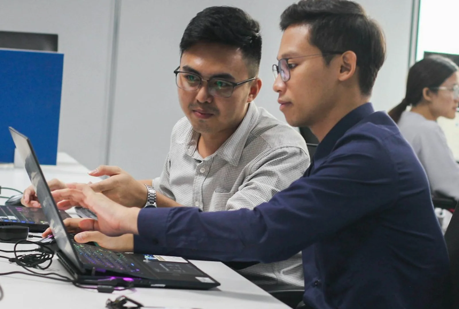 Laptop, notes, and planning materials during a sourcing review