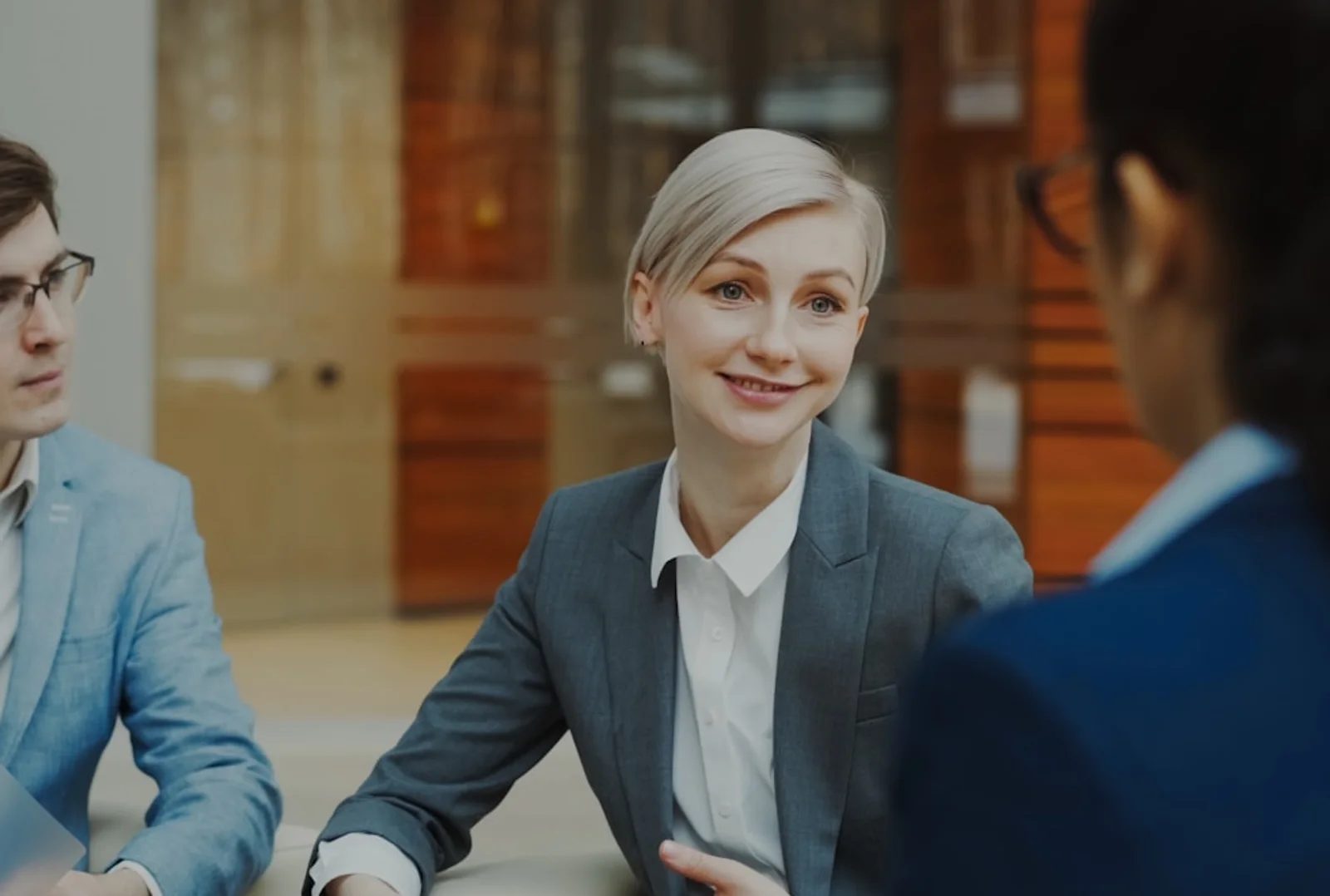 Two people reviewing supplier details and sourcing notes