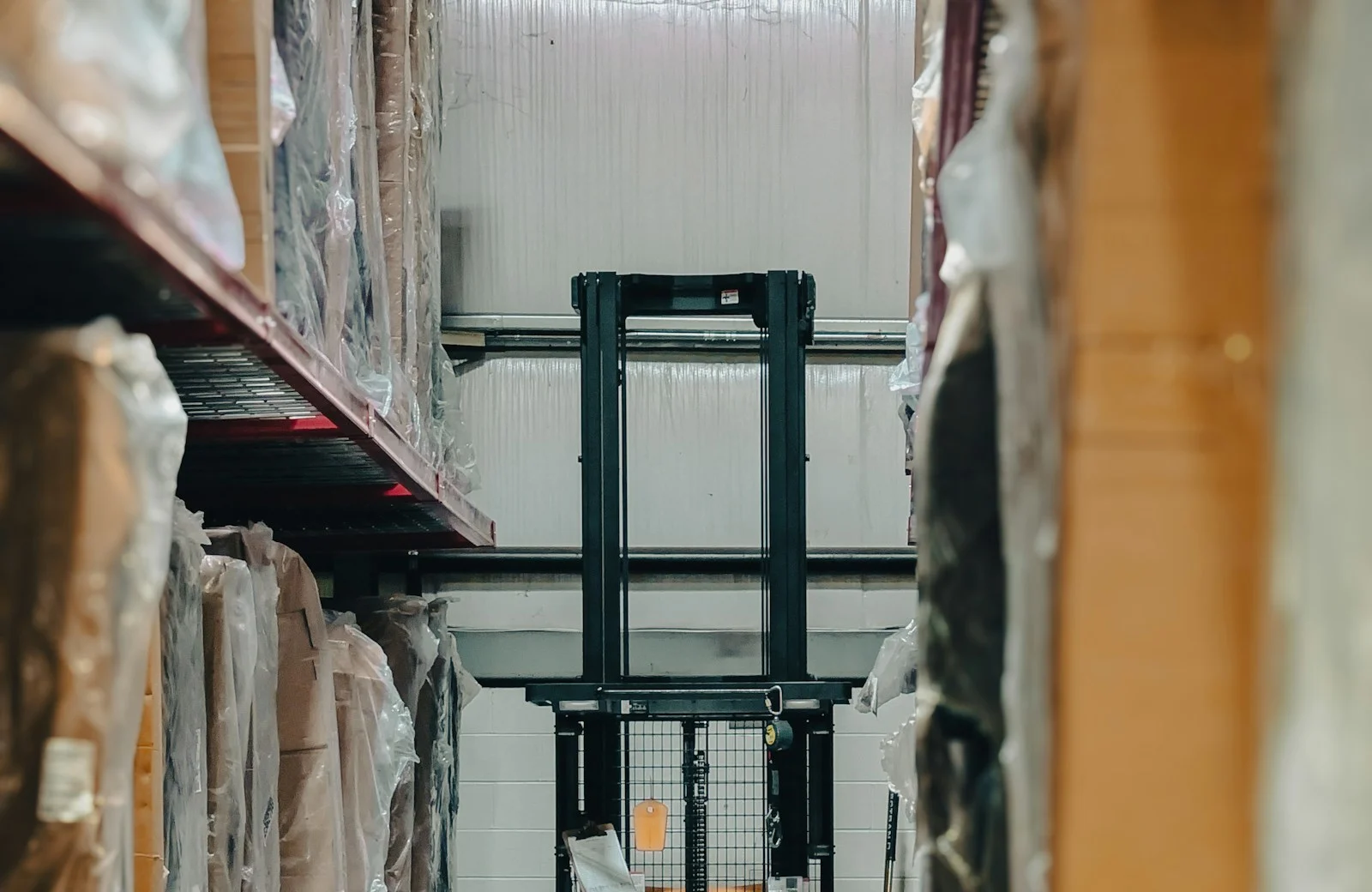 Warehouse shelves and boxes representing China product sourcing and order flow